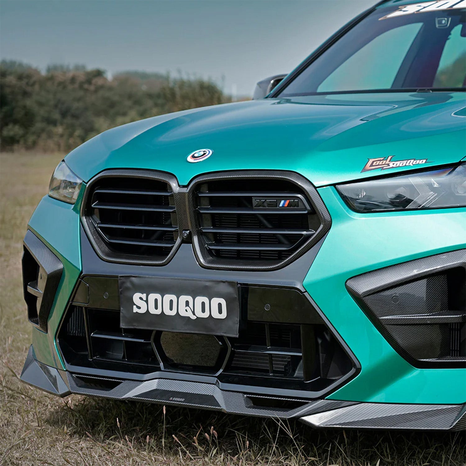 SooQoo BMW F95 X5M LCI Front Splitter In Gloss Carbon Fibre