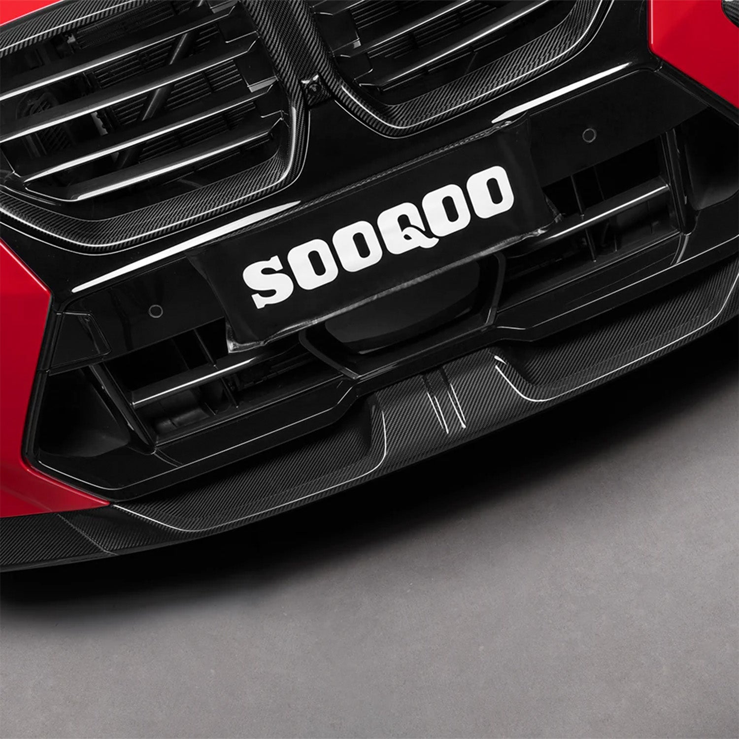 SooQoo BMW F96 X6M LCI Front Splitter In Gloss Carbon Fibre