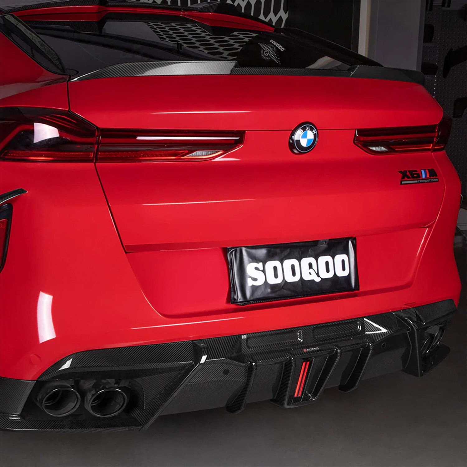 SooQoo BMW F96 X6M SQ-B Rear Diffuser With Brake Light In Gloss Carbon Fibre
