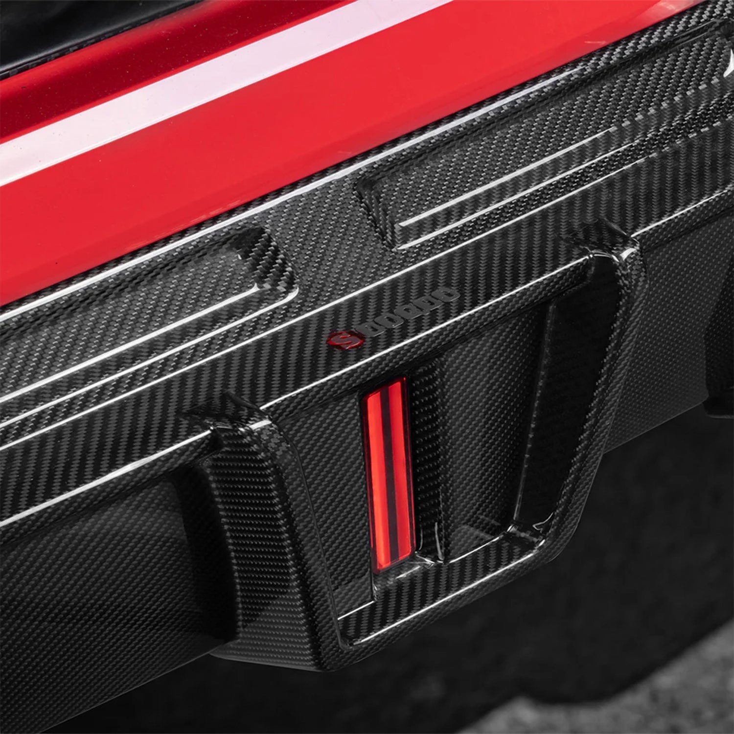 SooQoo BMW F96 X6M SQ-B Rear Diffuser With Brake Light In Gloss Carbon Fibre